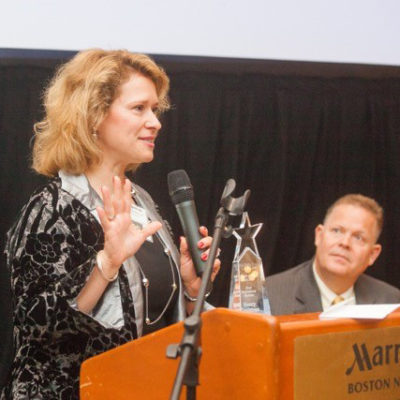 Nancy Capistran receiving award